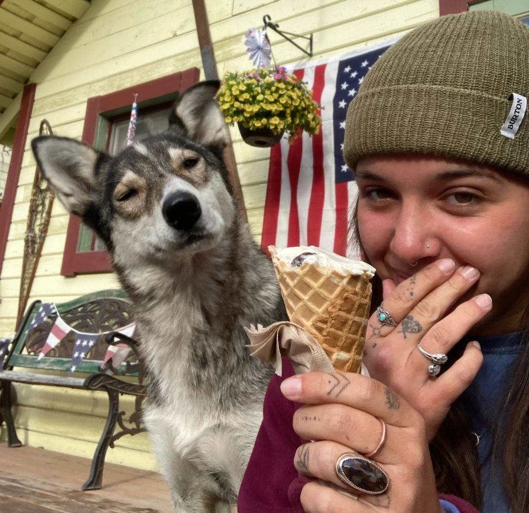 Customer enjoying ice cream with their dog